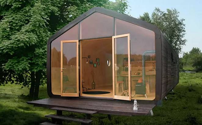 Проект маленького жилого дома, созданный для современной жизни на природе