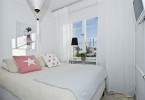 Интерьер стильной спальни в белом цвете