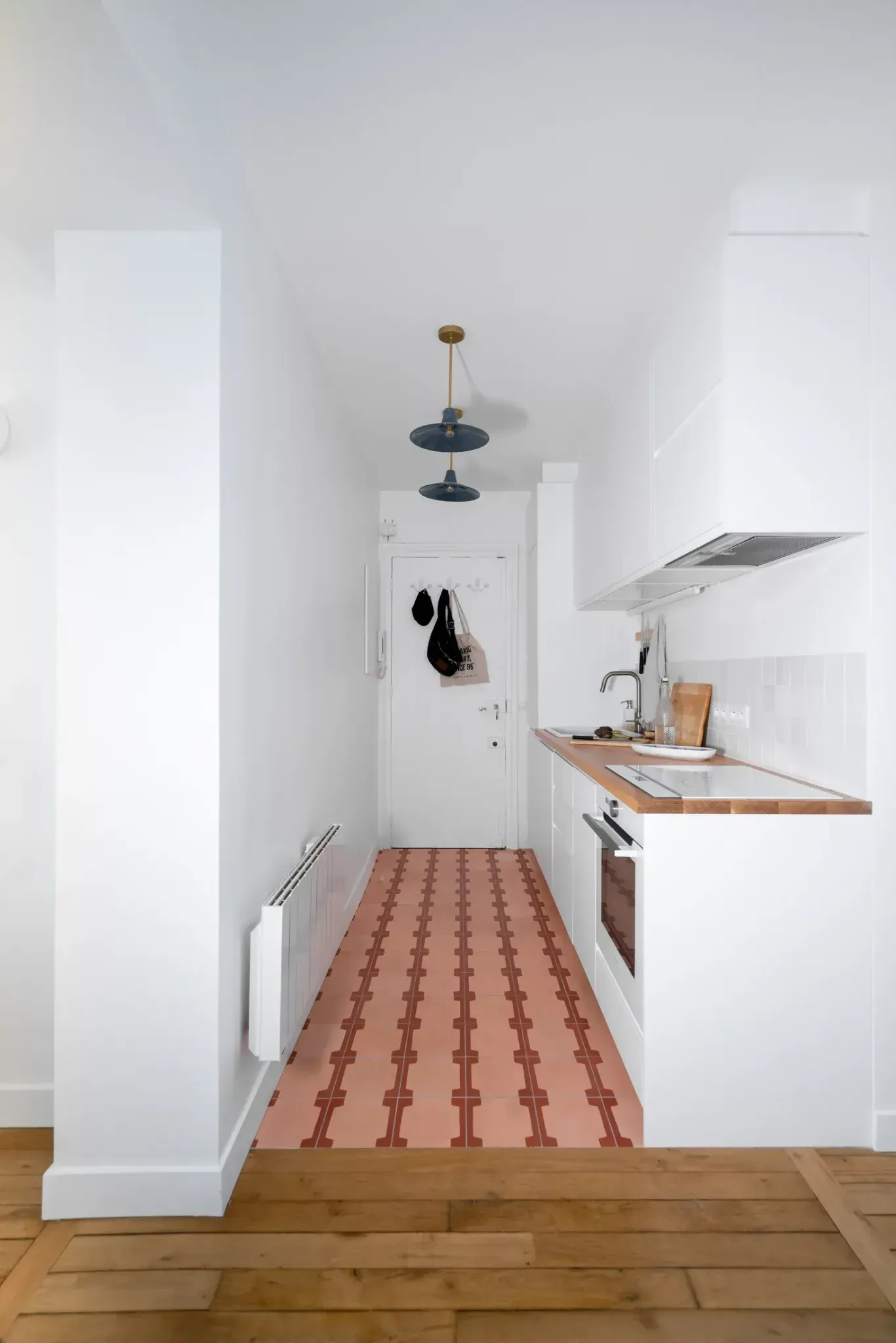 Узкая белая кухня с терракотовой плиткой Kitchen Cheat Sheet _ Never Too Small